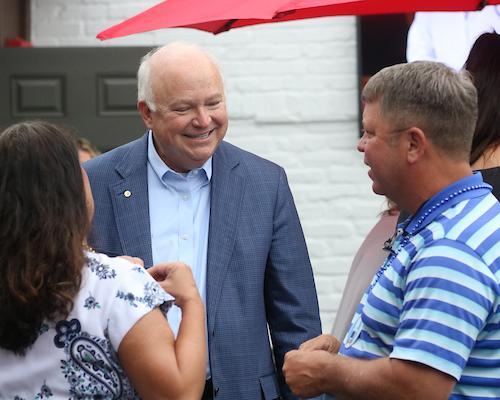 President Bonner speaking with alumni at Takeover Tuesday.